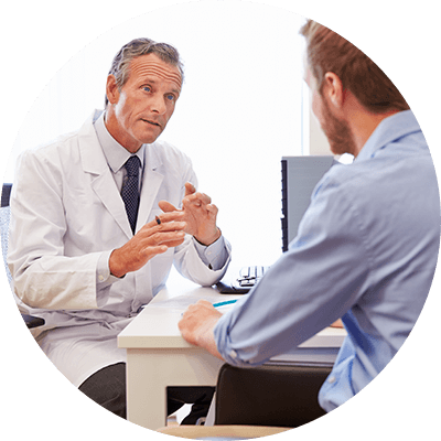 Cataract Surgeon Consulting with Patient