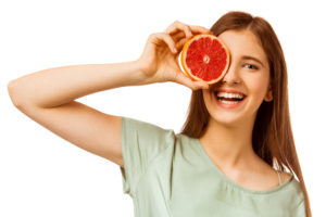 person with a grapefruit