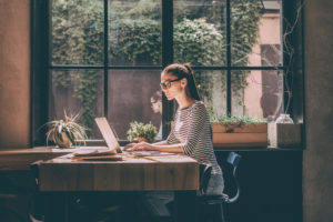 Person at Desk working on computer