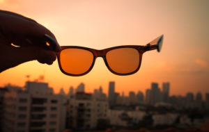 sunglasses against a sunset